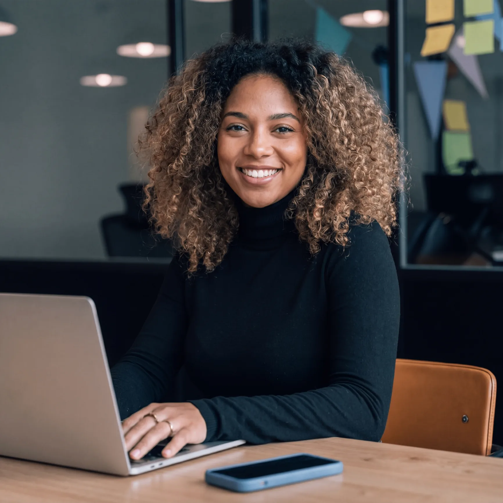 Fintology client working at a laptop
